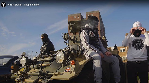 The video for 'Poppin Smoke' shared on YouTube showed Albanian gangster rappers driving military vehicles fitted with heavy machine guns around a British housing estate